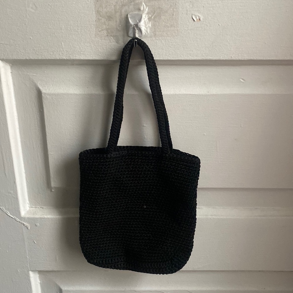 Thrifted black crocheted mini bag.